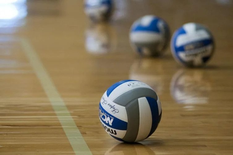 Volleyballs on Gym Floor